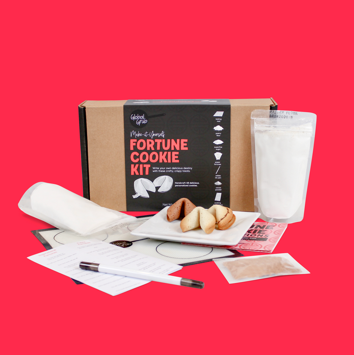 Fortune Cookie Kit includes pastry flour, superfine sugar, cocoa, edible ink pen, baking mat and cooking instructions